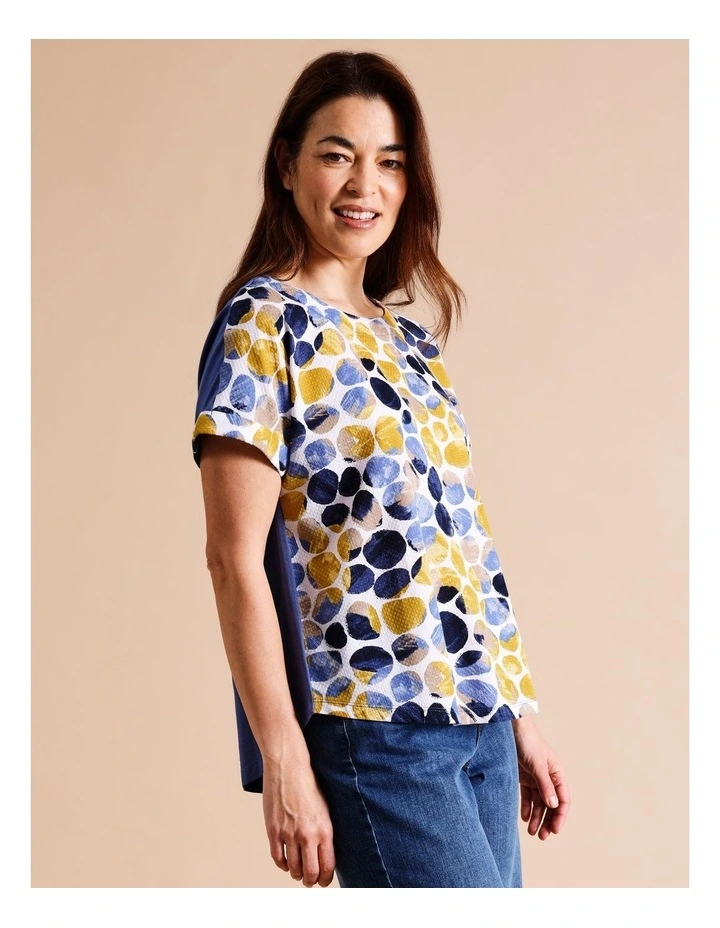 Organic Cotton Short Cuffed Magyar Sleeve Woven Front Tee With Knit Back In Navy/ochre/white Abstract Spot