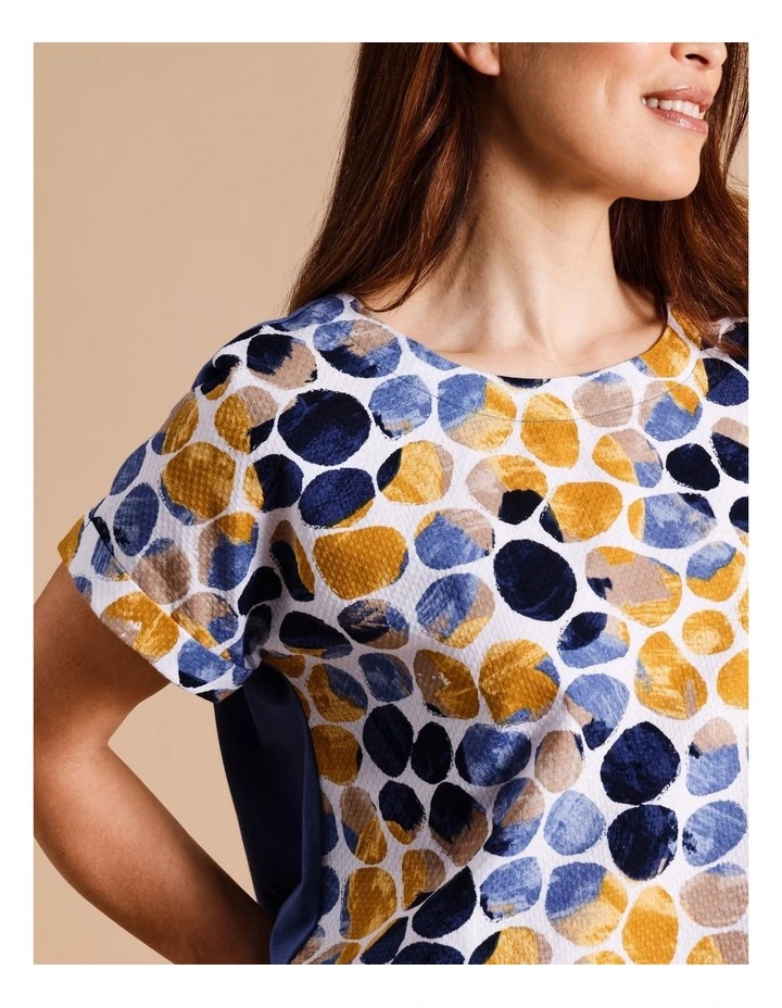 Organic Cotton Short Cuffed Magyar Sleeve Woven Front Tee With Knit Back In Navy/ochre/white Abstract Spot